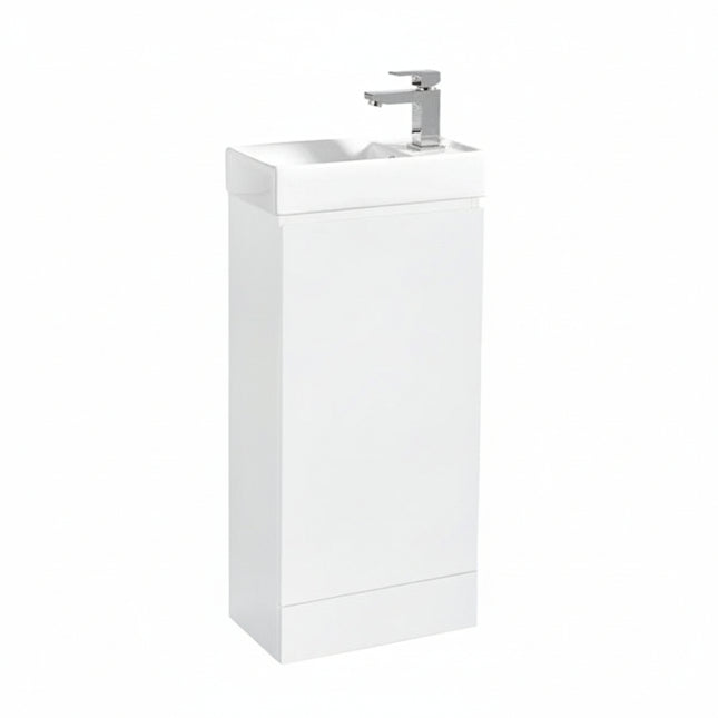 White bathroom vanity unit with sink and faucet on a white background