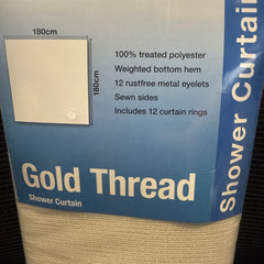 Euro Showers Gold Thread shower curtain packaged with a blue and white label, showing the beige woven curtain material rolled up on a dark textured surface.