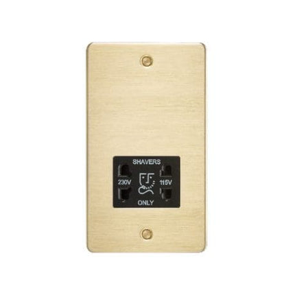 Brass electrical outlet with shaver socket on a white background