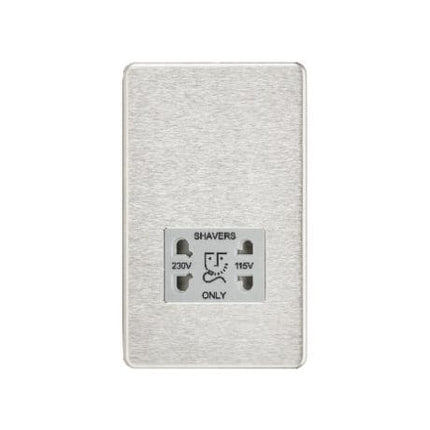 Silver electrical outlet with shaver socket on a white background
