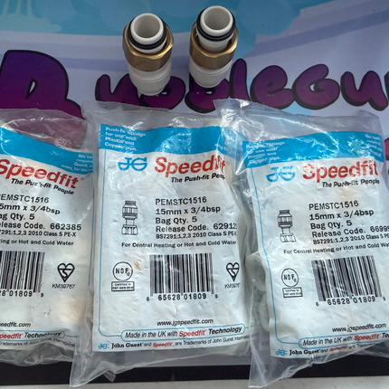 Three packages of Speedfit plumbing fittings on a colorful background