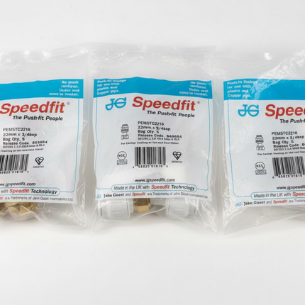 Three packages of Speedfit plumbing parts on a white surface.