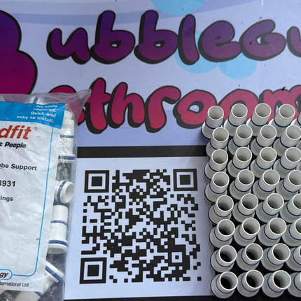 Packaged bubble wands with a visible brand label and QR code on a white surface.